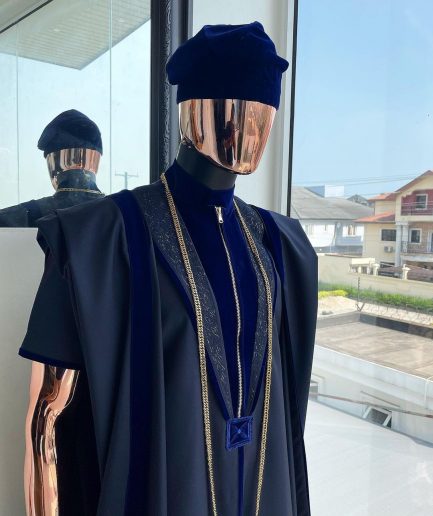 A Midnight blue, vehicular lapelled with zip line flap & navy blue soaked Italian velvet mix embroidery design details agbada