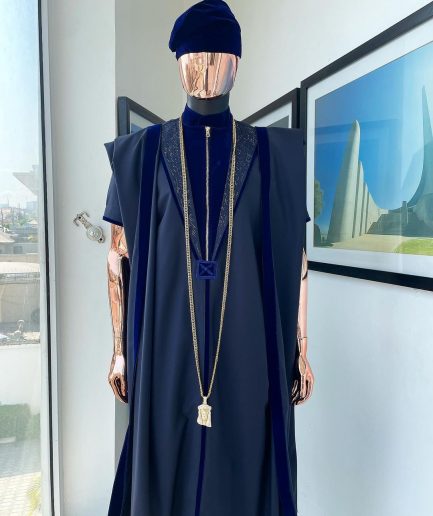 A Midnight blue, vehicular lapelled with zip line flap & navy blue soaked Italian velvet mix embroidery design details agbada