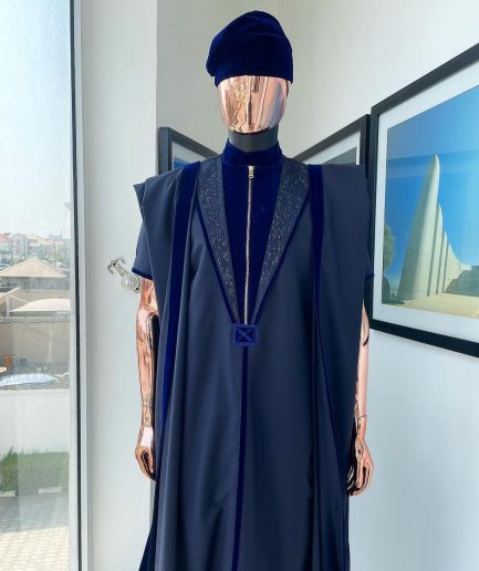 A Midnight blue, vehicular lapelled with zip line flap & navy blue soaked Italian velvet mix embroidery design details agbada