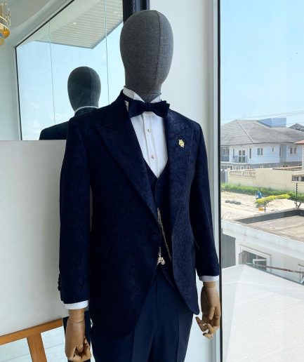 A peak lapel, ruffled floral pattern jacquard tuxedo suit