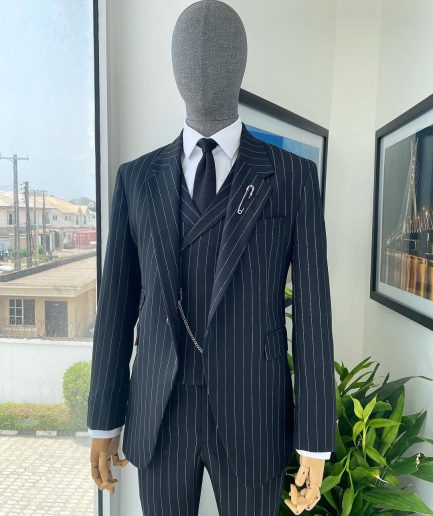 A charcoal black & white pencil stripe Jorgecarli ceremonial super 140's “Board Room” notch lapel patch pocket suit