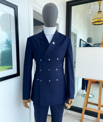An Navy blue “ibiza” wrap suit with snap buttons detailing