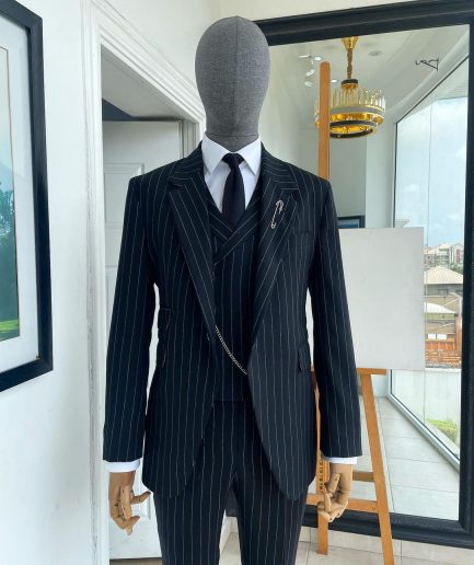 A charcoal black & white pencil stripe Jorgecarli ceremonial super 140's “Board Room” notch lapel patch pocket suit