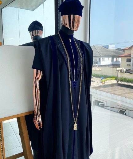 A Midnight blue, vehicular lapelled with zip line flap & navy blue soaked Italian velvet mix embroidery design details agbada