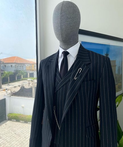 A charcoal black & white pencil stripe Jorgecarli ceremonial super 140's “Board Room” notch lapel patch pocket suit