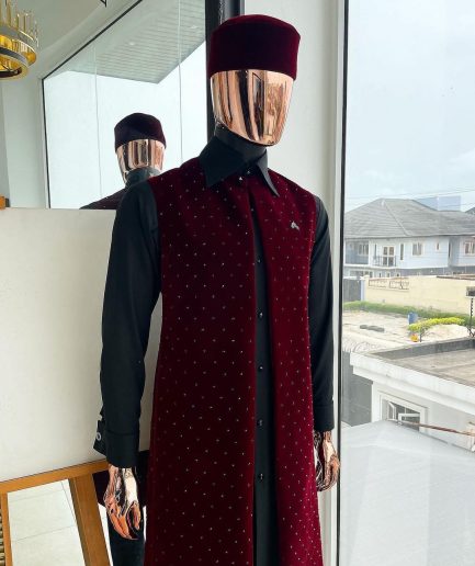 An “Eyes Wide Shut” mahogany red soaked Italian velvet Ceremonial suktan with black Swarovski stone detailing