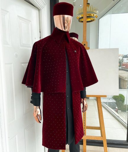 An “Eyes Wide Shut” mahogany red soaked Italian velvet Ceremonial suktan with black Swarovski stone detailing
