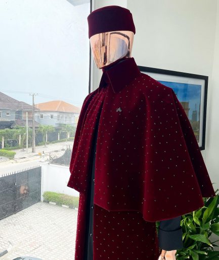 An “Eyes Wide Shut” mahogany red soaked Italian velvet Ceremonial suktan with black Swarovski stone detailing
