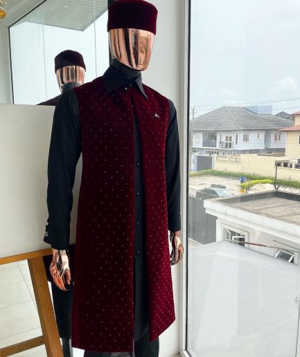 An “Eyes Wide Shut” mahogany red soaked Italian velvet Ceremonial suktan with black Swarovski stone detailing