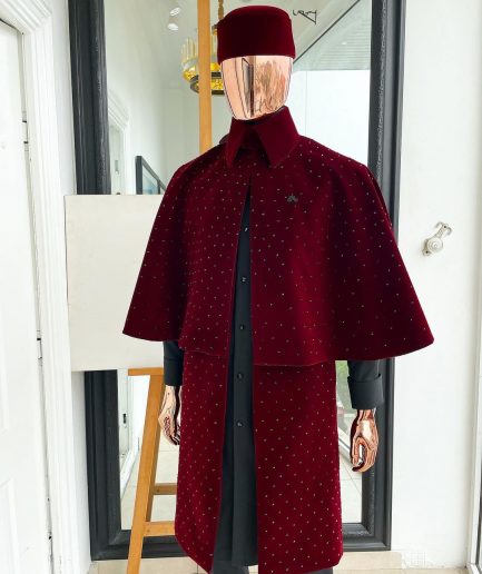 An “Eyes Wide Shut” mahogany red soaked Italian velvet Ceremonial suktan with black Swarovski stone detailing