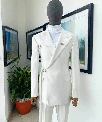A wrap and strapped ivory white, peak lapel suit