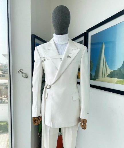 A wrap and strapped ivory white, peak lapel suit