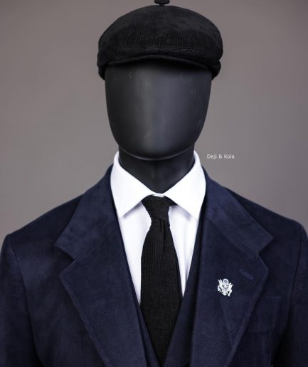 A Navy Blue Corduroy, notch lapel, patch pocket 2 button suit