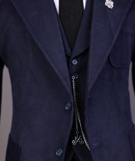 A Navy Blue Corduroy, notch lapel, patch pocket 2 button suit