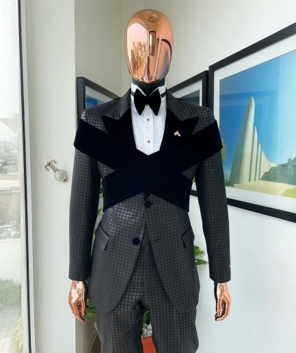 An “Octopus” black inverted square patterned metallic jacquard tuxedo with intersected black velvet peak lapel suit