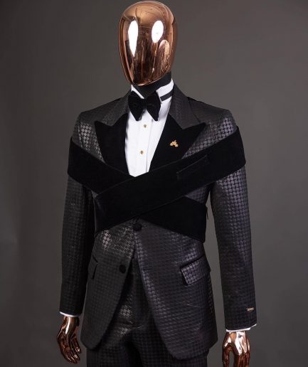 An “Octopus” black inverted square patterned metallic jacquard tuxedo with intersected black velvet peak lapel suit