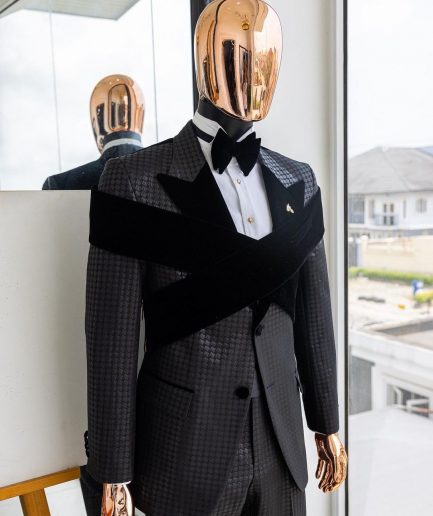 An “Octopus” black inverted square patterned metallic jacquard tuxedo with intersected black velvet peak lapel suit