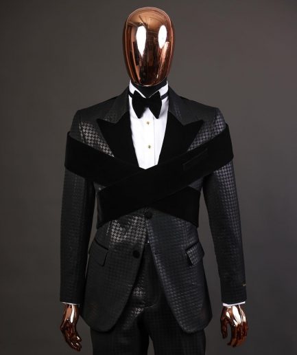 An “Octopus” black inverted square patterned metallic jacquard tuxedo with intersected black velvet peak lapel suit