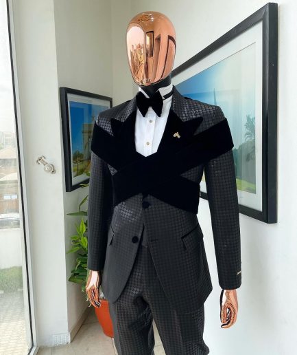 An “Octopus” black inverted square patterned metallic jacquard tuxedo with intersected black velvet peak lapel suit