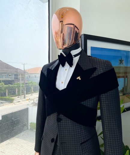 An “Octopus” black inverted square patterned metallic jacquard tuxedo with intersected black velvet peak lapel suit