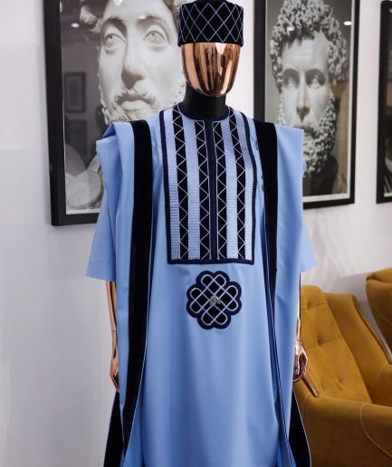 A Reloaded sky blue Monochrome embroidery with navy blue soaked Italian velvet detailing agbada