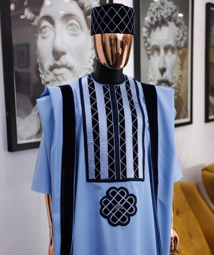 A Reloaded sky blue Monochrome embroidery with navy blue soaked Italian velvet detailing agbada