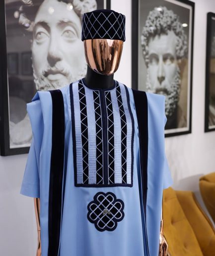 A Reloaded sky blue Monochrome embroidery with navy blue soaked Italian velvet detailing agbada