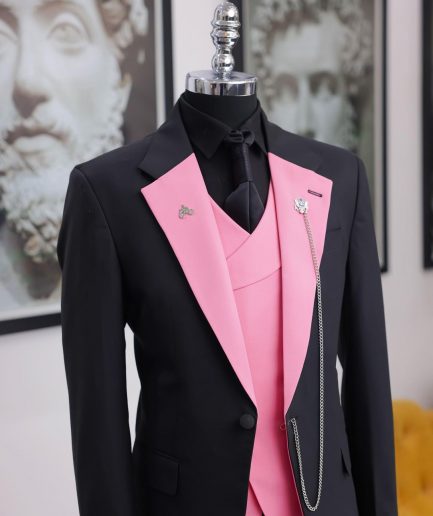 A charcoal black “contrast” pink notch lapel suit