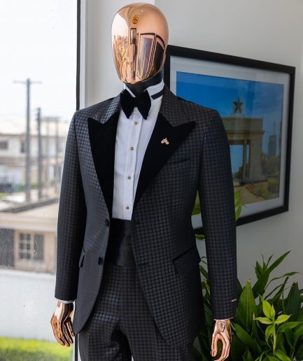 A Charcoal black inverted square patterned metallic jacquard tuxedo with charcoal black velvet peak lapel suit