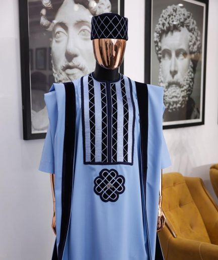 A Reloaded sky blue Monochrome embroidery with navy blue soaked Italian velvet detailing agbada