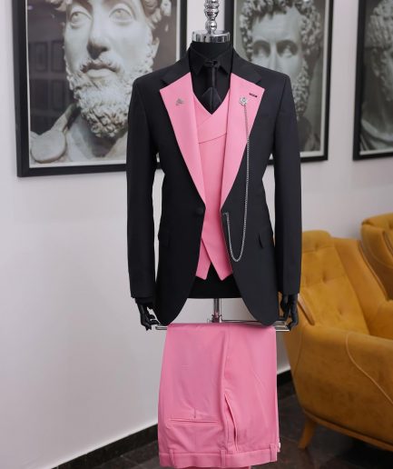A charcoal black “contrast” pink notch lapel suit