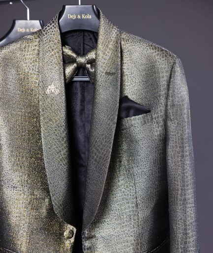 An “alligator” patterned gold metallic jacquard tuxedo suit