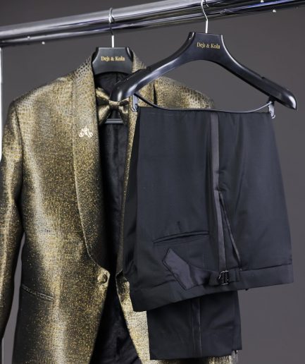 An “alligator” patterned gold metallic jacquard tuxedo suit