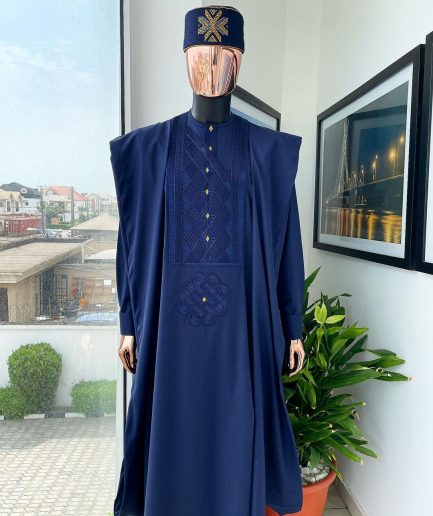 A Navy Blue, Slanting Cube With Dotted Gold Detailing Agbada