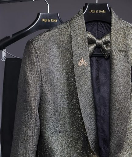 An “alligator” patterned gold metallic jacquard tuxedo suit