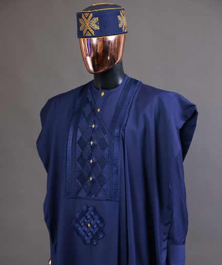 A Navy Blue, Slanting Cube With Dotted Gold Detailing Agbada