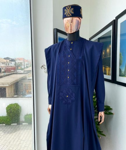 A Navy Blue, Slanting Cube With Dotted Gold Detailing Agbada