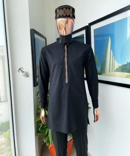 A charcoal black, starkled connected rectangle embroidery detailing African traditional kaftan, fila and Sokoto