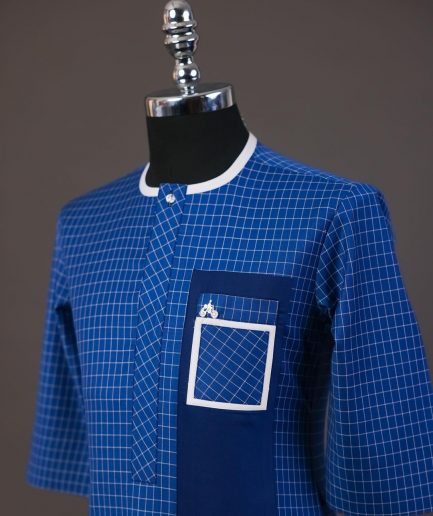 A Neon blue, graph check, front flap with Swarovski button details, and layered pocket traditional senator kaftan native