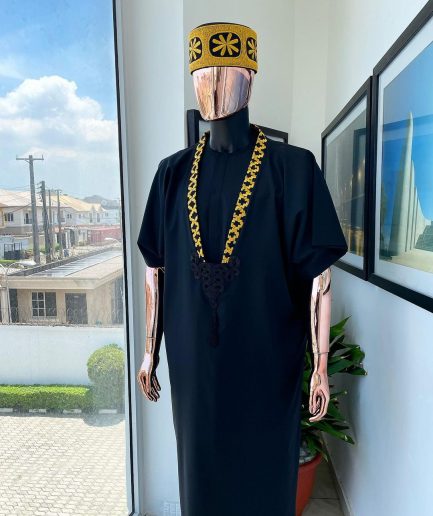 A charcoal black dagbtan, connected star gold embroidery detailing senator native.
