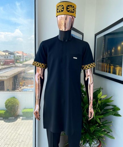 A Charcoal black, connected star gold embroidery detailing Senator Kaftan native.