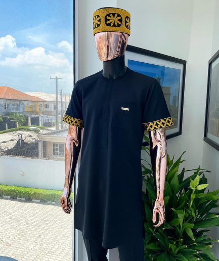 A Charcoal black, connected star gold embroidery detailing Senator Kaftan native.