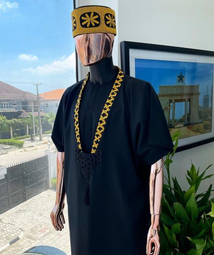 A charcoal black dagbtan, connected star gold embroidery detailing senator native.