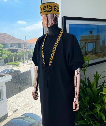A charcoal black dagbtan, connected star gold embroidery detailing senator native.
