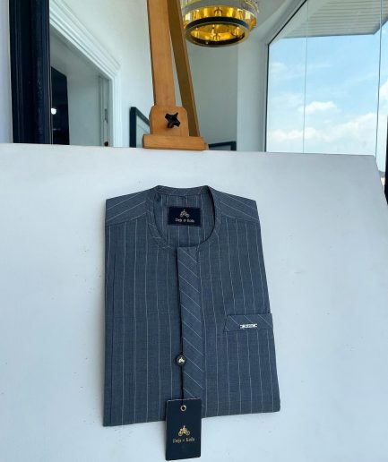 An iron-grey pencil stripe, front flap, and slant pocket detail Senator Kaftan native