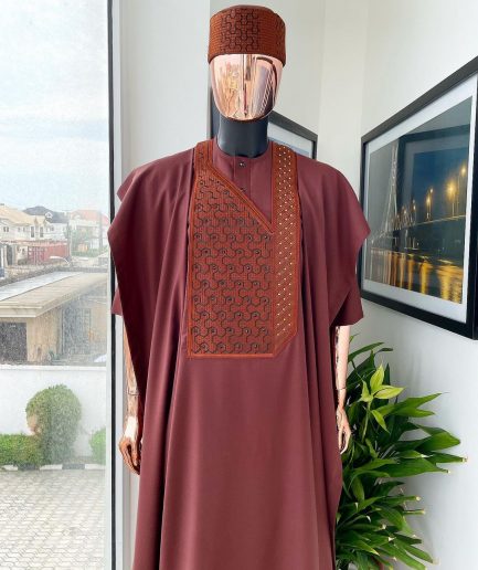 A Cinnamon brown spiral binding embroidery detailing with black and gold ss20 Swarovski stud agbada