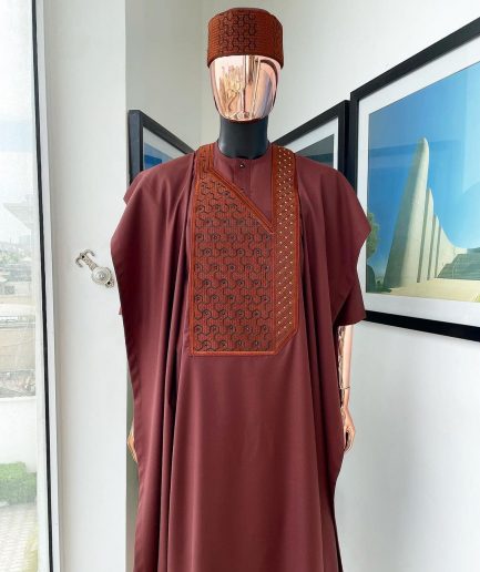 A Cinnamon brown spiral binding embroidery detailing with black and gold ss20 Swarovski stud agbada