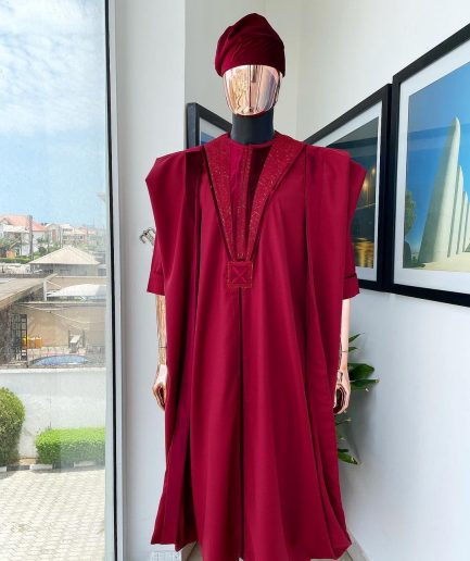 A Maroon red, vehicular lapelled with closed line flap and marching velvet mix embroidery design agbada