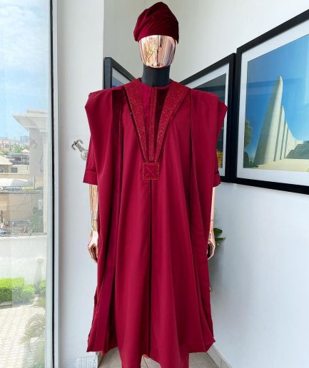 A Maroon red, vehicular lapelled with closed line flap and marching velvet mix embroidery design agbada