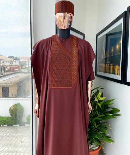 A Cinnamon brown spiral binding embroidery detailing with black and gold ss20 Swarovski stud agbada
